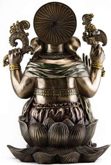 Back view of gold-tone Ganesha resin statue with circular halo disk and lotus base