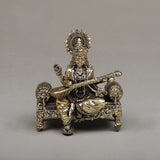 Brass Maa Saraswati seated sculpture holding veena on ornate base, 4 inches