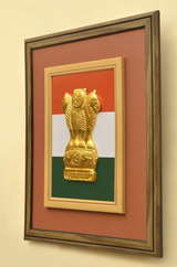 Gold Ashoka emblem pillar framed with tricolour design, angled