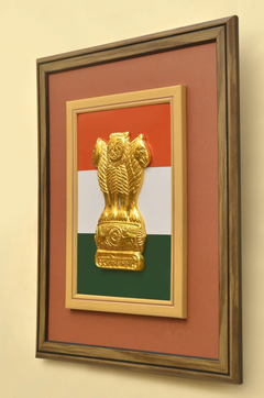 Gold Ashoka emblem pillar framed with tricolour design, angled