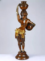 Brass lady statue raising a pot on one arm, milk pot on head, 44 in tall
