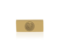 Gold Aura Booster block with circular swirl symbol on the front