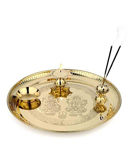 Brass puja thali with engraved rim, central diya stand and two small holders