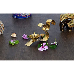 Brass diya oil lamp with OM-style multi-armed holder and central flame
