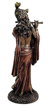 Murli Krishna bonded bronze statue from behind, flowing hair and draped robe