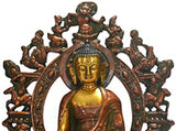 Gold-tone Buddha head with jeweled crown and guardian-figure halo