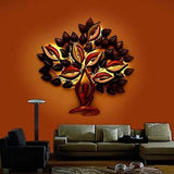 Iron yoga tree light sculpture, gold frame with red, blue and green petal LEDs