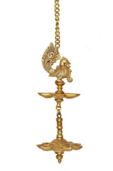 Brass peacock oil diya on hanging chain with central flame bowl and tiered base