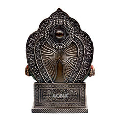 Lord Kuber resin idol from back, ornate halo design and carved base, 5.5 in height.