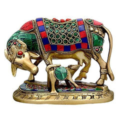 Brass cow and calf idol, front view, colorful beaded panel and carved ornaments