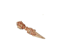 Brass furba phurpa angled view, decorated head and pointed tip