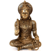 Brass seated Hanuman blessing devotees, cross-legged figure with halo and detailed jewelry