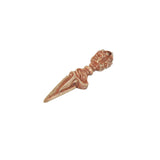 Brass furba phurpa lying down, pointed tip and ornate handle details