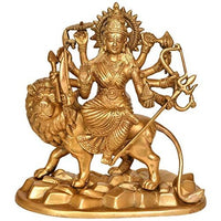 Brass Maa Durga decorative idol statue, holding weapons, standing on lion and rocks