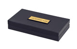 Closed black gift box with gold label reading “JAI SHREE RAM”