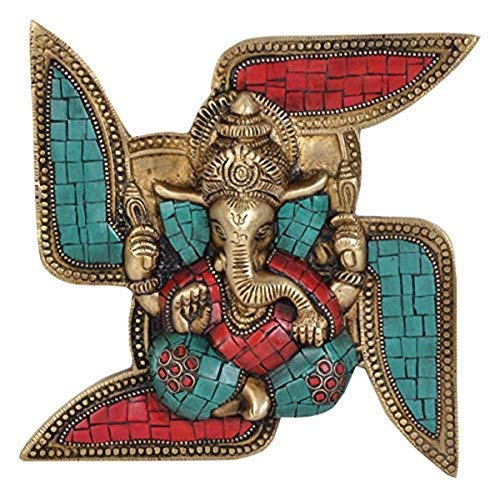 Brass Ganesha wall hanging on swastika with red and turquoise inlay tiles