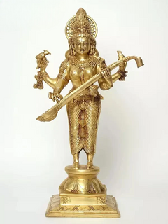 Brass Saraswati statue holding veena, ornate crown, full front view, 23 inches