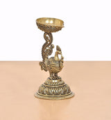 Brass peacock diya holder statue, detailed feathers, swirling support, round base