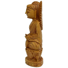 Carved wooden Buddha statue, side profile with detailed hair and robe folds