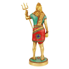 Brass standing Bholenath idol rear view, trident held up, green and red garments