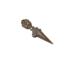 Brass dorje furba phurpa angled view, engraved handle and crown