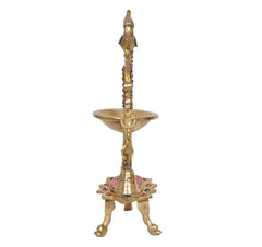 Brass peacock diya stand with oil bowl on tripod legs and hanging chain bell
