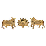 Brass cow pair with lotus wall decor, front view of three relief figures
