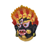Front view Nazar Battu suraksha kavach with open mouth and ornate gold decorations