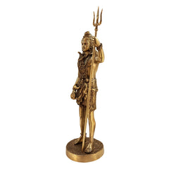 Brass Shankar Bhagwan standing idol, angled view holding trident up