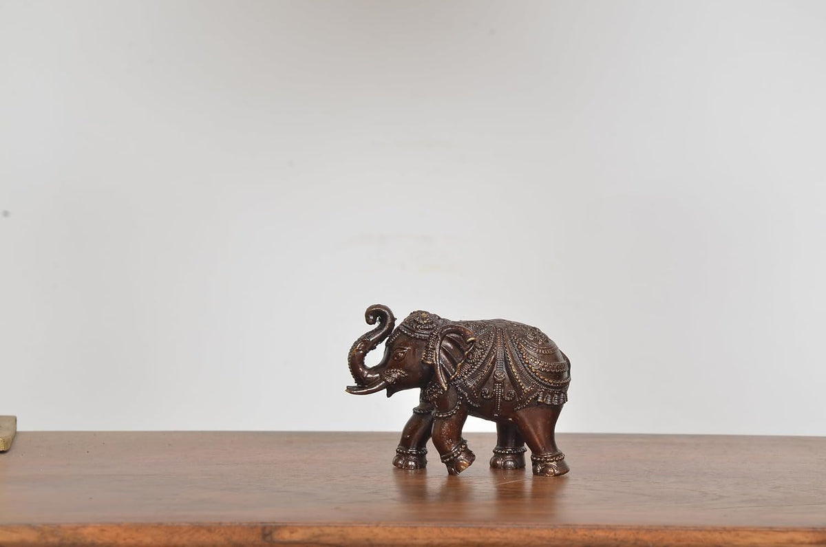 Superfine brass elephant figurine, brown, side view with raised trunk
