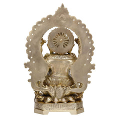 Brass Ganesha statue back view on lotus base with ornate circular halo