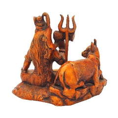 Brass Shiva seated with holy cow figurine, copper red finish, side view