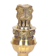 Close-up brass Ashoka stambh lion finial with ornate engraved rings