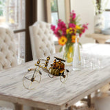 Iron rickshaw showpiece with ant rider, gold-toned metal and dark bronze wheels