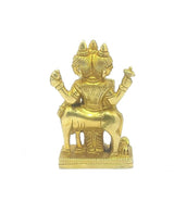 Brass Dattatreya idol statue on pedestal, three-head profile with raised arms