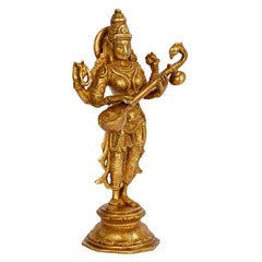 Maa Saraswati statue with four arms holding a bow-like instrument and lotus, gold-tone