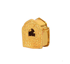 Gold-toned gau box side view with ornate front and hinged back cover