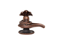 Copper Shiva ling figurine with cobra hood and ornate base, front view