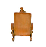 Back of brass Ganesha statue on chair, turban figure and carved backrest