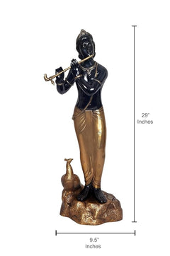 Black Krishna idol statue size: 29 inches tall, 9.5 inches wide; flute and gold accents