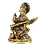 Brass Saraswati idol (5-inch) raising hand and holding veena across lap