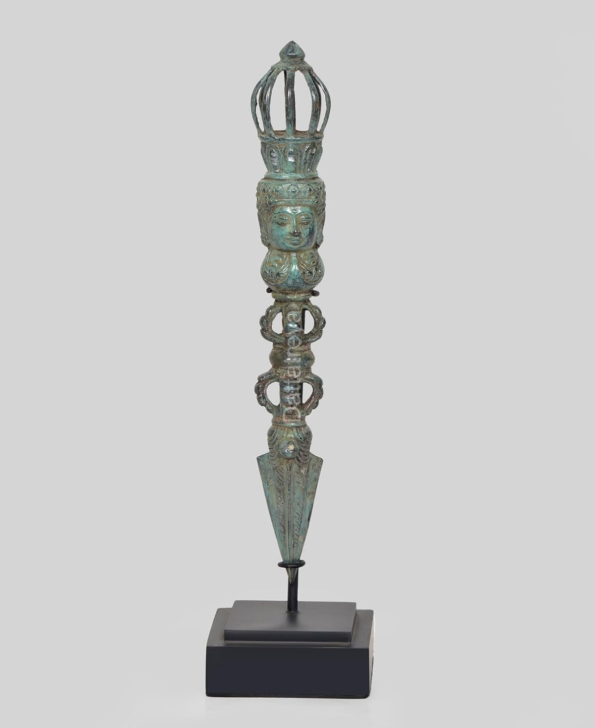 Vintage bronze phurpa ritual dagger with crown top and carved figures on dark base