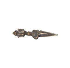 Brass furba phurpa side view, faceted crown and conical point
