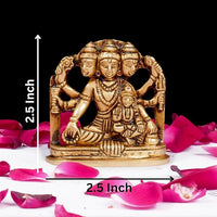 Brass Dattatreya-Laxmi idol, seated, height indicated as 2.5 inch