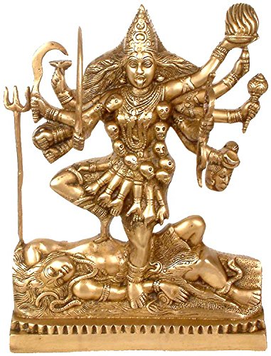Brass goddess statue idol of Maa Kali with many arms, seated on snake base