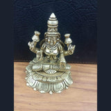 Brass Maa Lakshmi decorative idol, seated on lotus with four hands, 3.1 in