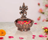 Copper Krishna urli bowl showpiece with miniature deity figurine and round lotus base