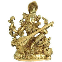 11.5 in brass Saraswati statue holding veena, seated, ornate details