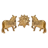 Brass cow and lotus wall decor, three-piece relief design with two cows and flower