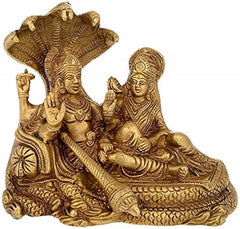 Brass 6-inch Vishnu and Lakshmi idol on Sheshnag, ornate detailing